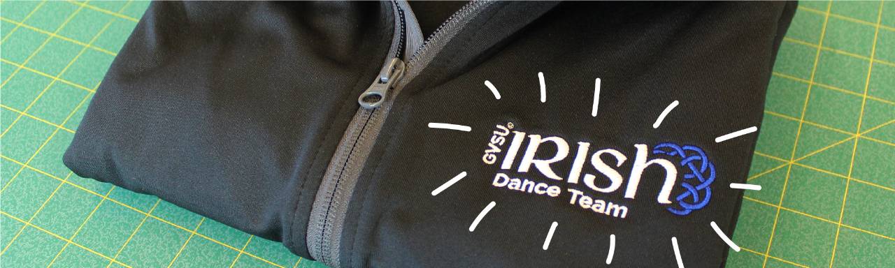 Embroidery on a jacket that says Irish Dance Team